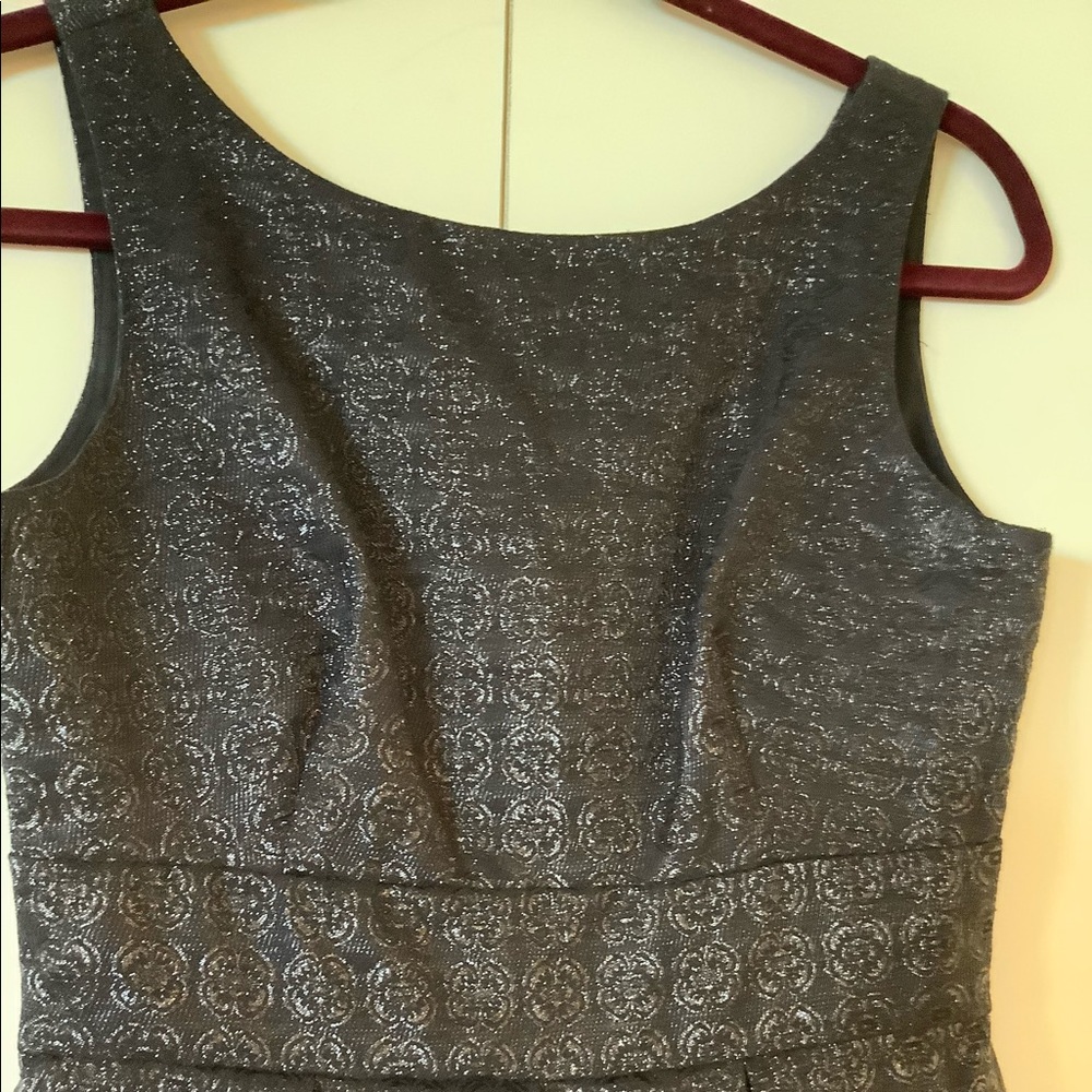 Sleeves Little black dress with silver glitter.